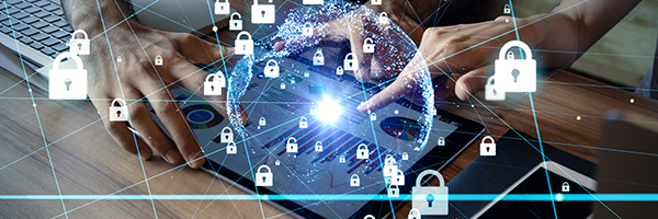 Two people working on a tablet surrounded by an smartphone and laptop computer with an graphical image of IoT device security superimposed on top.