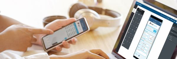 Someone looking at an app on a smartphone while app services are being delivered via the SOTI Snap interface which is being displayed on a laptop screen.