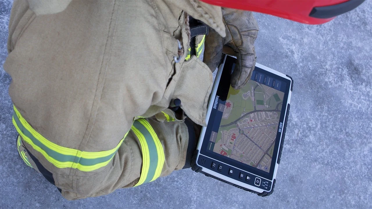 Firefighters using tablet